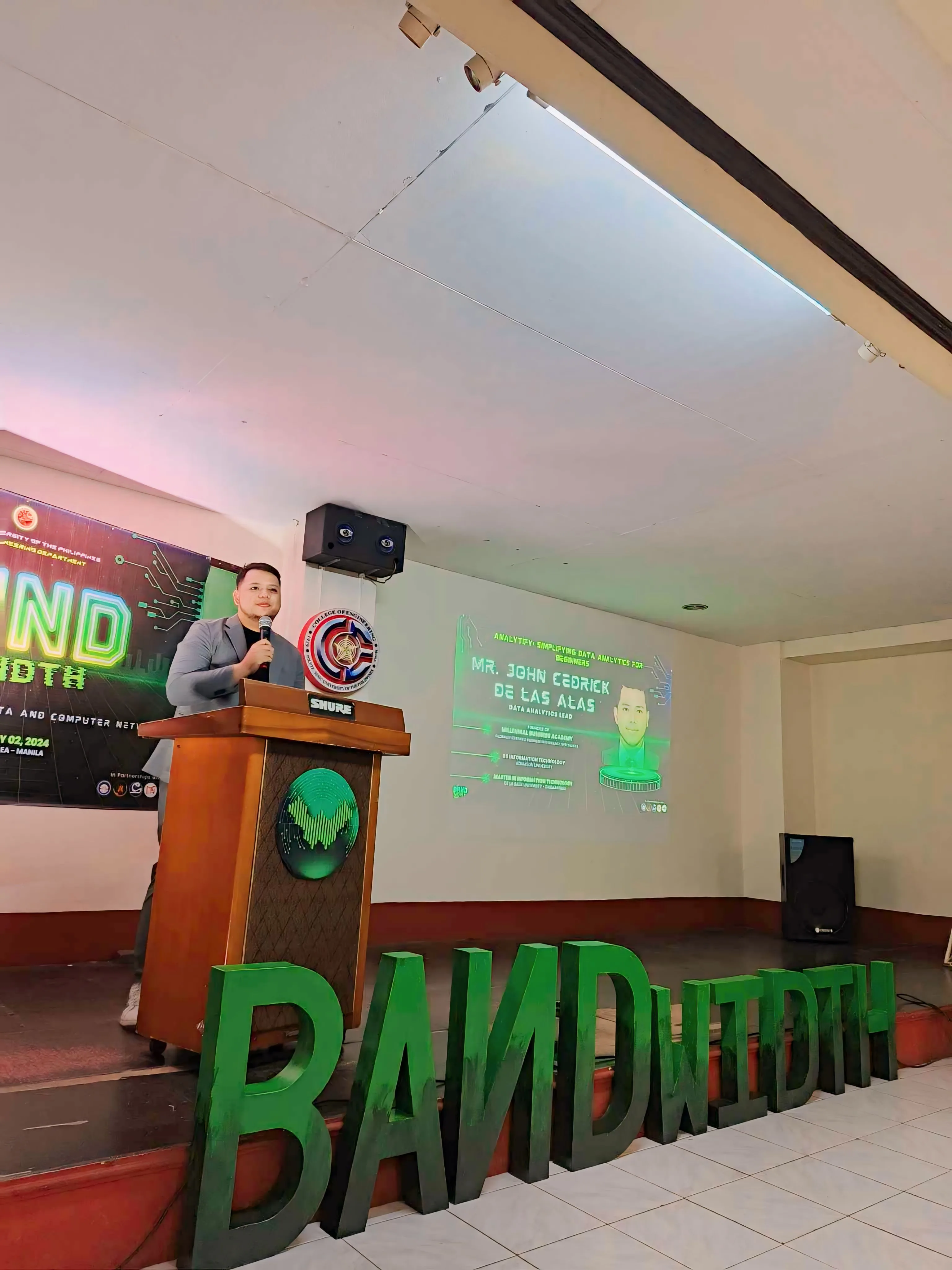 JC de las Alas speaking at a corporate training session